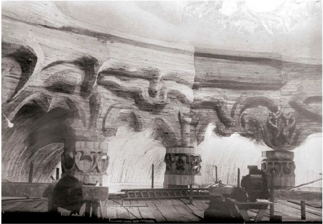 The large domed room of the first Goetheanum during construction. Architrave and capitals of the first two columns above the entrance, followed by the second to sixth columns on the left